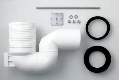 A collection of plumbing parts laid out on a light gray background.
