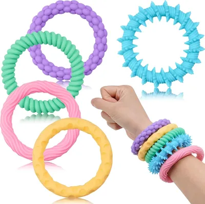 Imagen del producto de Pulseras elásticas de silicona para aliviar el estrés, juguetes sensoriales - Set de 5 - Colores pastel