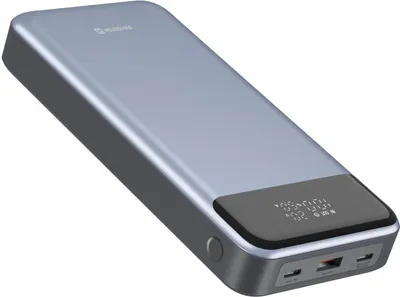 A gray power bank with a black digital display is shown against a white background.