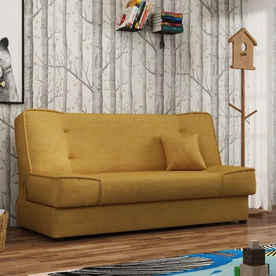 A yellow sofa is placed in a room with a forest-themed wallpaper.