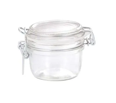 A clear glass jar with a metal clasp lid.