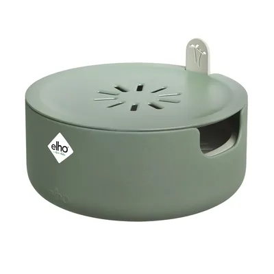 A green microgreens growing container with a lid and ventilation holes.