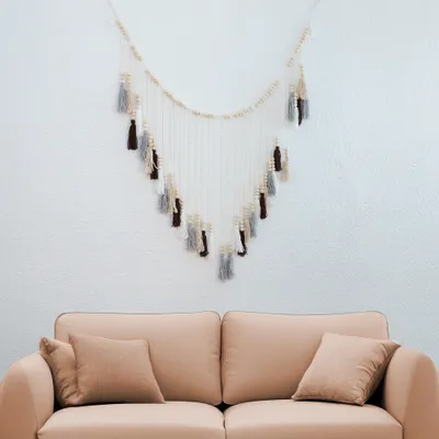 Immagine prodotto di DECCARO Makramee Girlande "Tassel", 130 x 75 cm