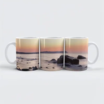 Produktbild von raxxa Premium-Tasse "Abendlicht am Steinstrand"