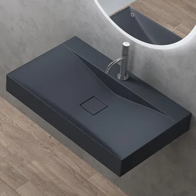 A modern bathroom sink with a sleek design.
