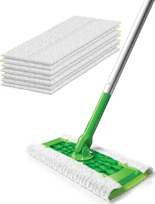 A mop with a stack of cleaning pads.