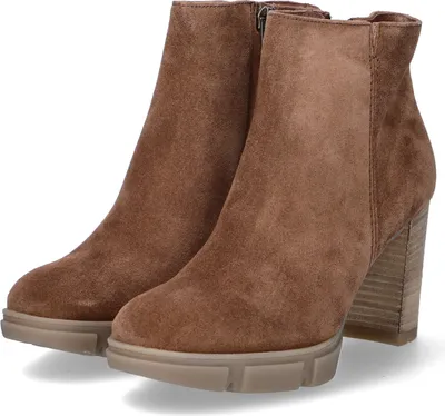 A pair of brown suede ankle boots with block heels and platform soles, shown from a three-quarter front view against a white background.