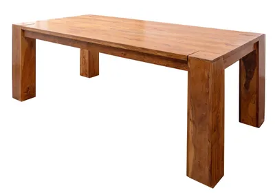 A wooden dining table with thick legs, shown from a slight angle against a white background.