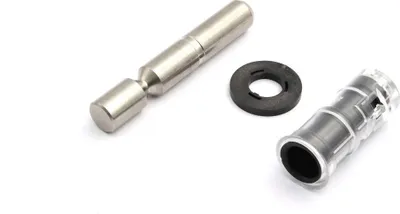 A metal pin and a clear plastic fitting with a black rubber seal are arranged on a white background.