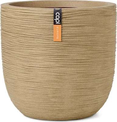 A close-up studio shot of a beige planter pot with a textured surface.