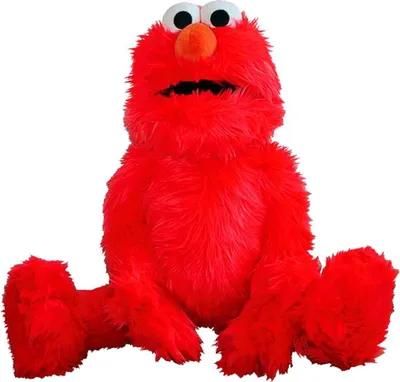 A plush toy of Elmo from Sesame Street sitting down.