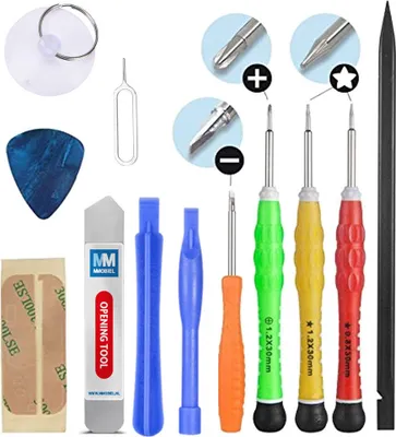 A collection of electronic repair tools laid out on a white background.