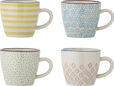 Four ceramic mugs with different patterns are displayed against a white background.