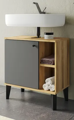 A bathroom vanity with a sink and faucet.