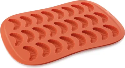 An orange silicone mold with 24 worm-shaped cavities.