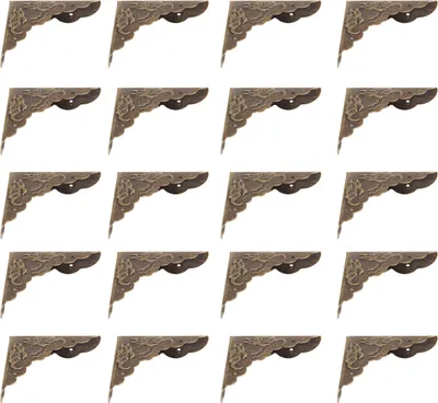 A grid of 16 identical decorative corner protectors for boxes or furniture.