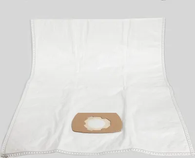 A white vacuum cleaner bag is laid flat on a light gray background, with its cardboard connector piece visible in the center.