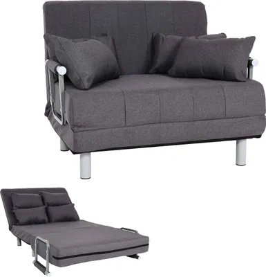 A dark gray sofa bed is shown in two configurations: as a sofa with pillows and as a fully extended bed. The background is plain white.