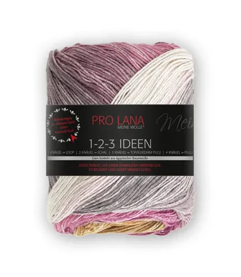 A ball of yarn with a gradient color pattern, featuring a label with product information.