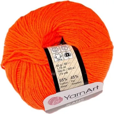 A ball of orange yarn with a label.