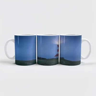 Produktbild von raxxa Premium-Tasse "Nordsee Leuchtturm am Abend"