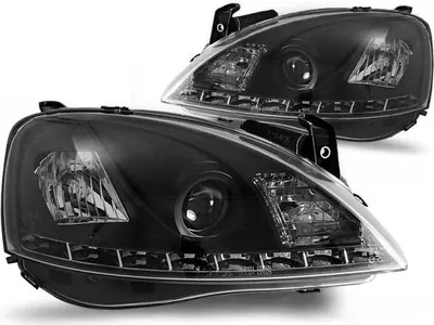 Produktbild von Scheinwerfer LED Tagfahrlicht Optik passend für Opel Corsa C Bj. 00-06 Schwarz