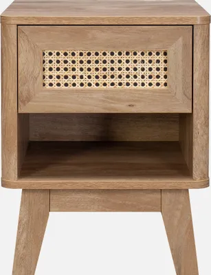 A close-up front view of a wooden nightstand with a drawer and an open shelf.