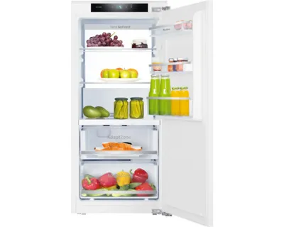 An open refrigerator filled with various food items.