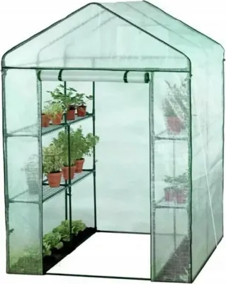 A mini greenhouse with shelves filled with potted plants.