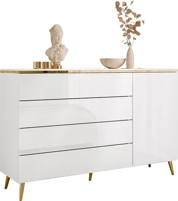 A white high-gloss dresser with four drawers and a cabinet door, decorated with a bust sculpture, a bowl, and a vase with dried branches.