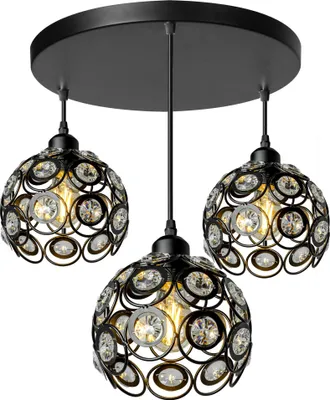 A black chandelier with three crystal-encrusted globes hangs from a black circular ceiling mount.