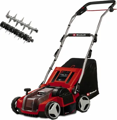 A red and black electric lawn scarifier and aerator with accessories.