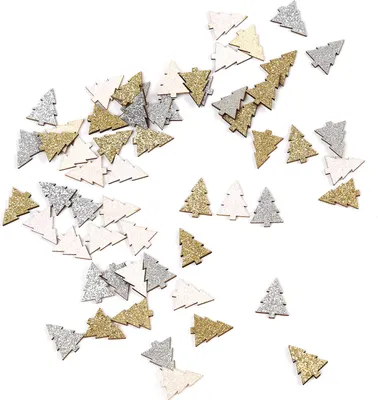 A scattered collection of small, glitter-covered wooden Christmas tree cutouts in white, silver, and gold.