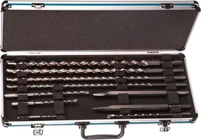 A set of drill bits and chisels in a black foam-lined case.