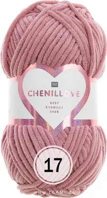 A ball of pink chenille yarn with a label.