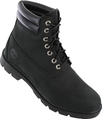 A black Timberland boot is shown against a white background.