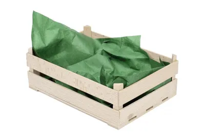 A wooden crate lined with green tissue paper, presented against a white background.