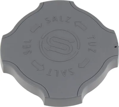 A gray cap with text and arrows indicating direction.