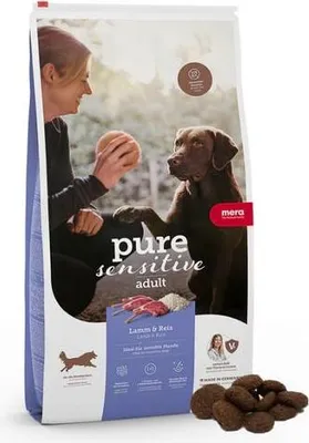 A bag of dog food with a woman and a dog in the background.