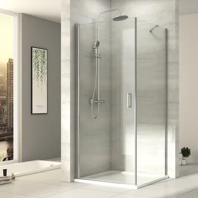 A modern bathroom with a glass shower enclosure.