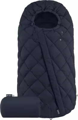 A navy blue quilted footmuff is shown against a white background, with a smaller rolled-up version of the footmuff to the left.