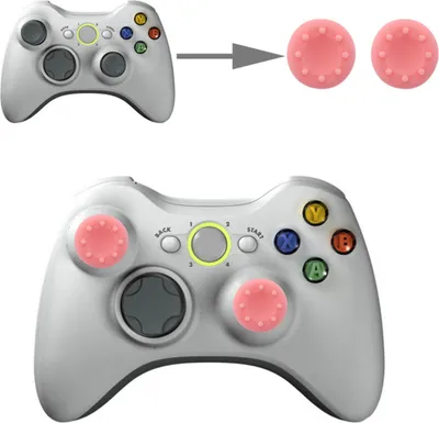 A white Xbox 360 controller with pink thumb grips and a diagram showing the thumb grips being applied.