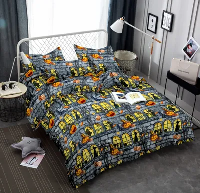 A Halloween-themed duvet cover set is displayed on a bed.
