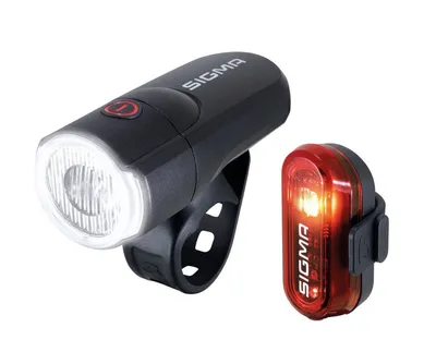 Produktbild von Sigma Sport Aura 30 + Curve Set, Heckbeleuchtung + Frontbeleuchtung (Set), Schwarz, IPX4, LED, Rot/Weiß, Blinklicht, Ständiges Licht