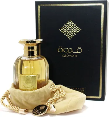 A bottle of perfume and its packaging are displayed against a white background.