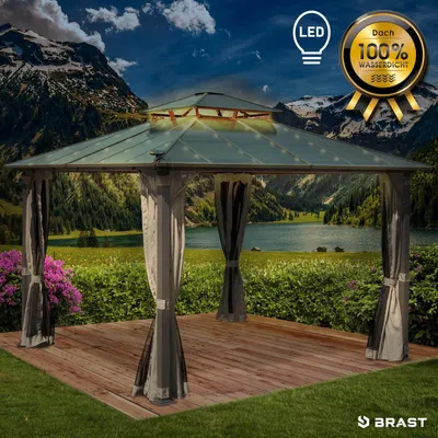 A gazebo set up in a scenic outdoor location with mountains and a lake in the background.