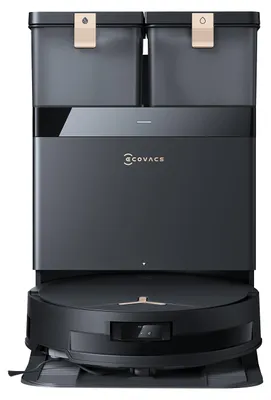 A front view of a black and gray robot vacuum cleaner with a charging dock.
