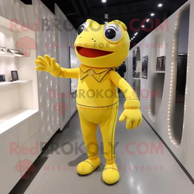 Obrázek produktu pro Postava REDBROKOLY maskota žluté žáby oblečená s kombinézou a chrániči nohou