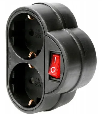 A black electrical adapter with a red switch is shown against a white background.