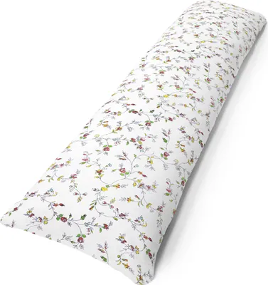 A long, floral-patterned pillow is shown diagonally against a white background.